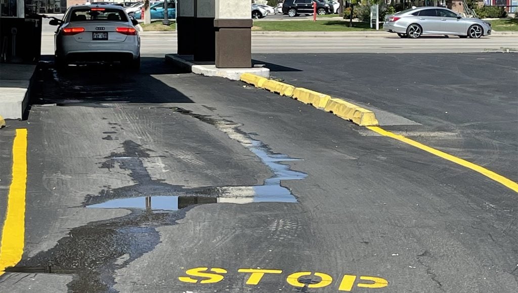 recently striped parking stalls at Racherito’s Mexican Food in West Jordan, Utah