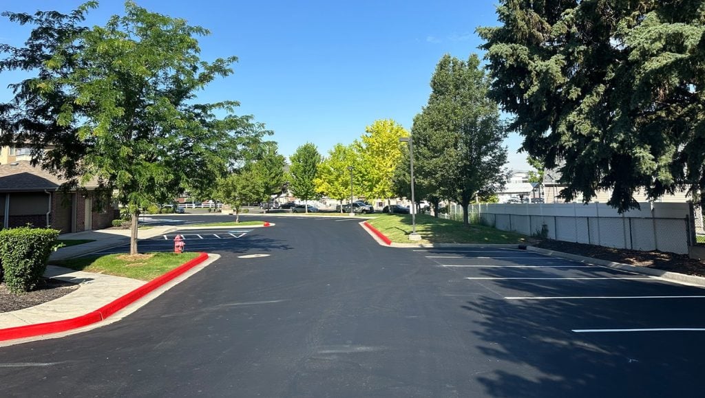 Huntington Apartments parking lot before line markings