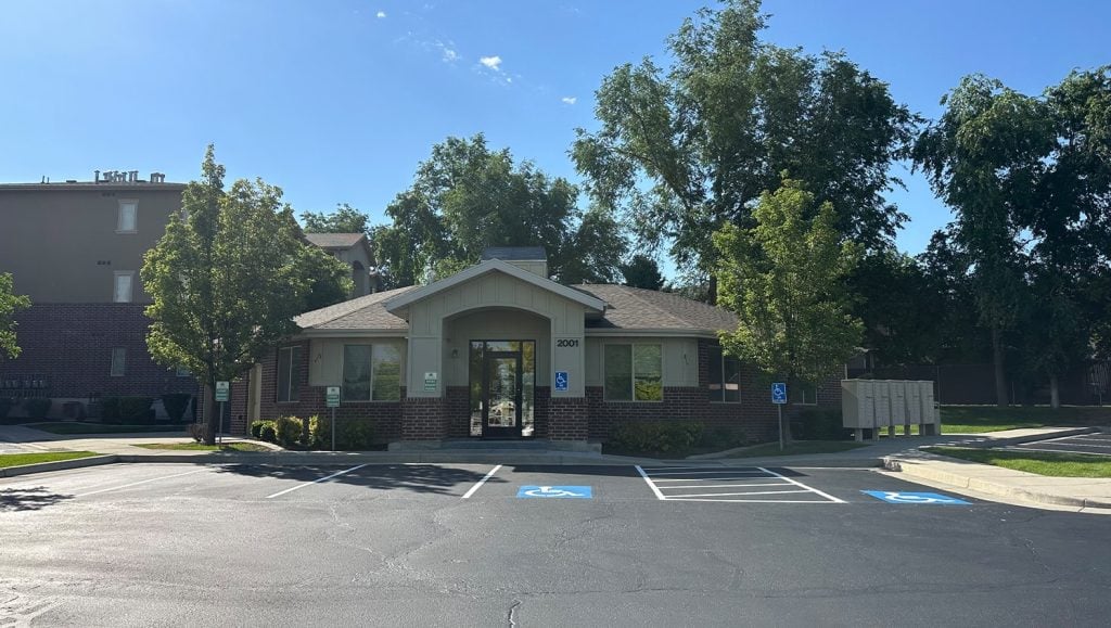 Huntington Apartments parking lot with fresh seal coating