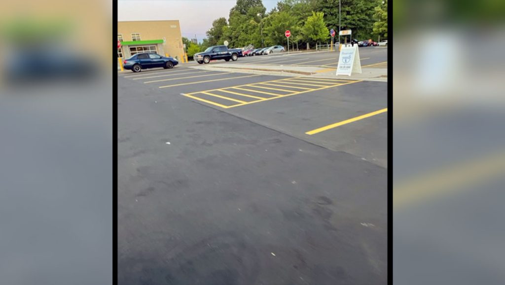 striped directional arrow and stop bar at greensboro walmart