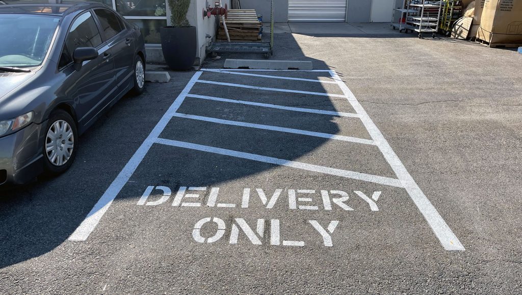 re-striped parking stalls at Cactus and Tropics in Draper, Utah