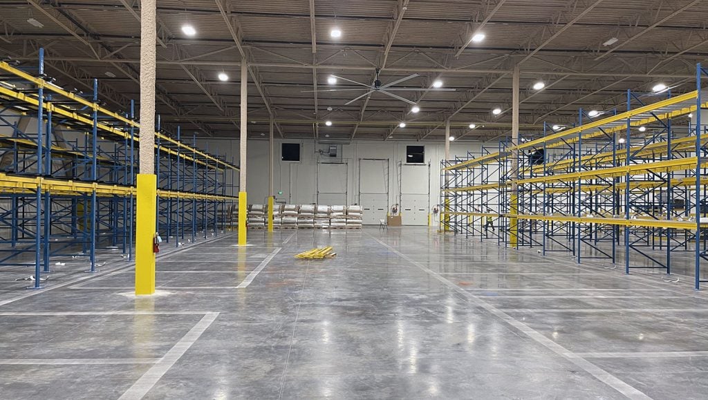 before shot of warehouse before new floor markings were striped
