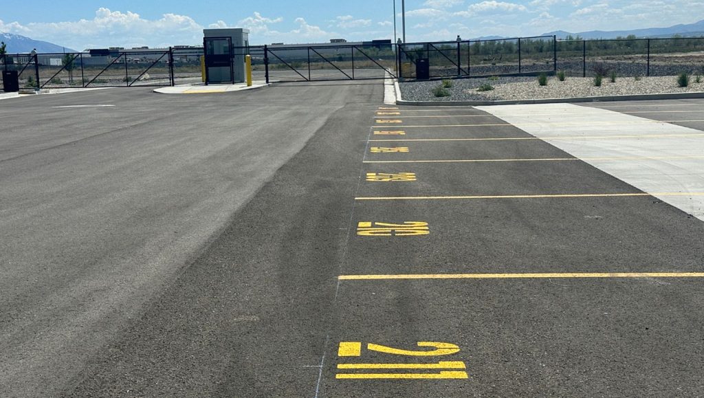 close-up of parking spots freshly painted for New Balance Distribution Center