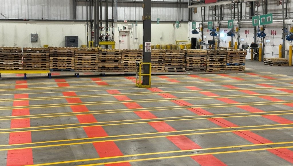 TJ MAXX Distribution Center warehouse with freshly painted line markings