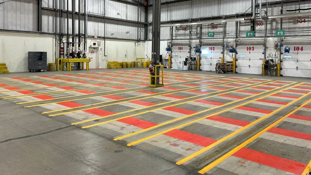 freshly painted warehouse markings for TJ MAXX Distribution Center