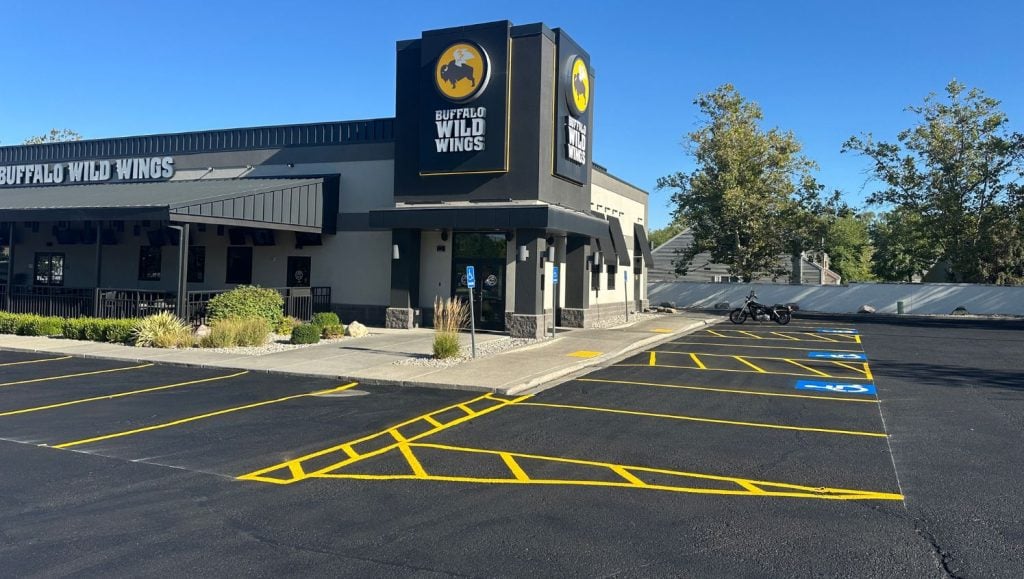 front view of Buffalo Wild Wings parking lot freshly painted