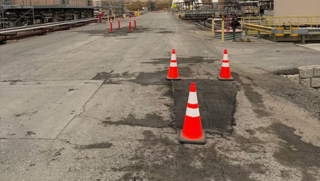 Chevron parking lot with freshly poured asphalt