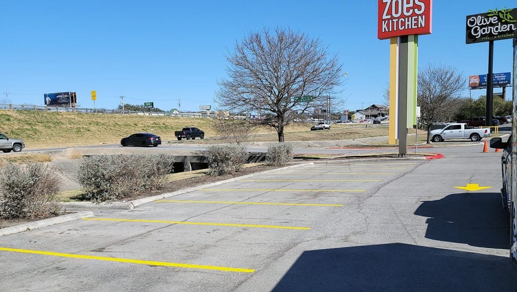 re-striped parking lot arrow