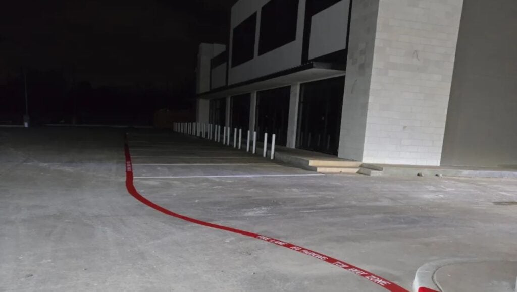 HEB Fuel parking lot with fire lane striping freshly painted