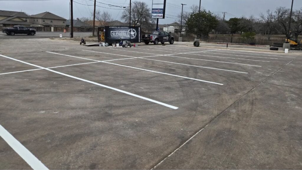 parking spots freshly painted for HEB Fuel parking lot