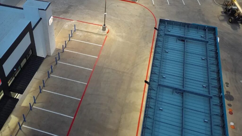 HEB Fuel parking lot freshly painted aerial view