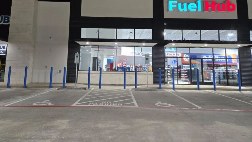 close-up of ada compliance parking spots freshly painted for HEB Fuel