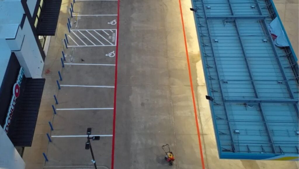aerial view of HEB Fuel parking lot freshly painted