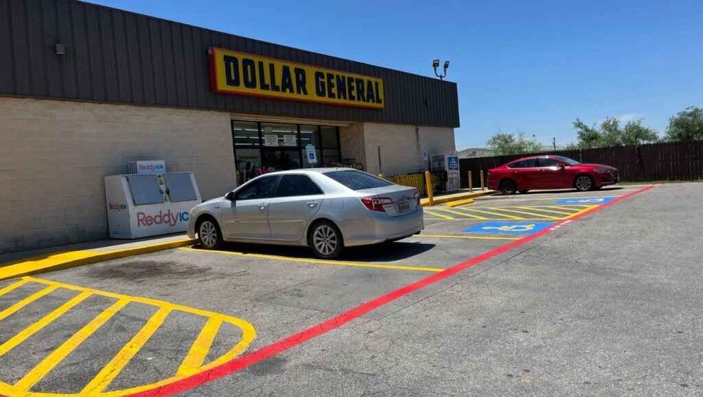 fire lane striping freshly painted for Dollar General parking lot