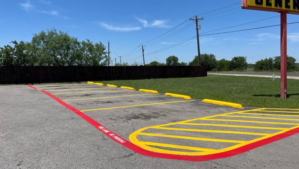 parking spots freshly painted for Dollar General parking lot