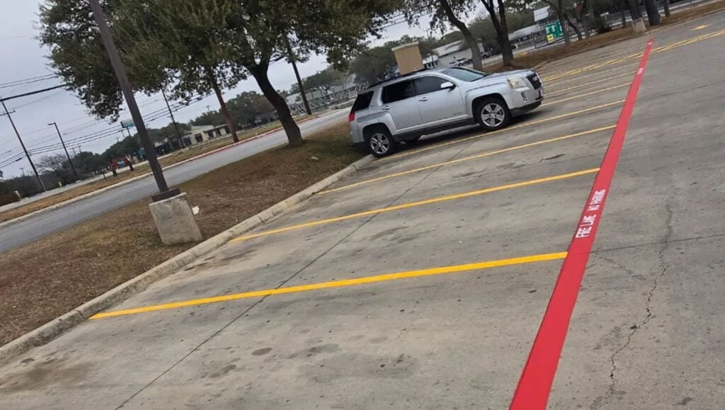 parking spots freshly painted for Texas Roadhouse parking lot