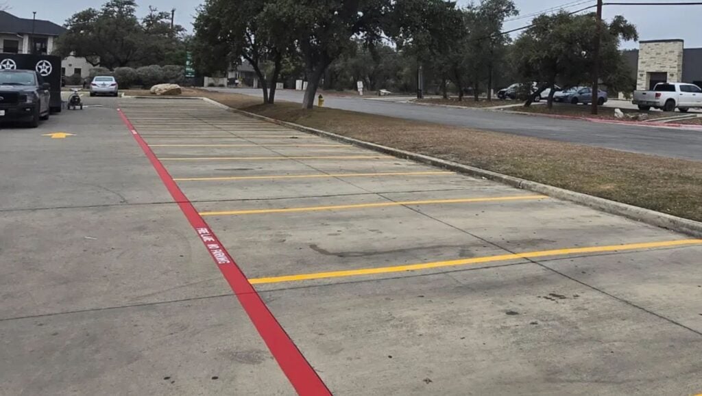 Texas Roadhouse parking lot with fire lane striping freshly painted