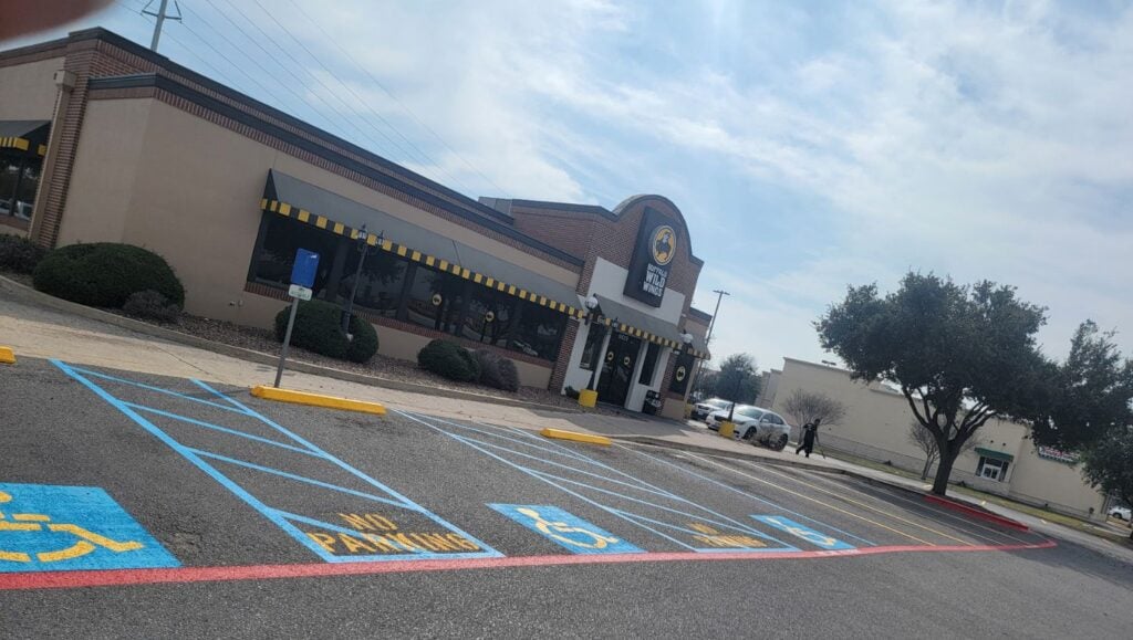 Buffalo Wild Wings parking lot with ada compliance parking spots freshly painted