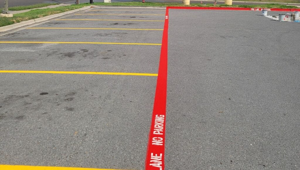 close-up of fire lane striping freshly painted for Buffalo Wild Wings parking lot