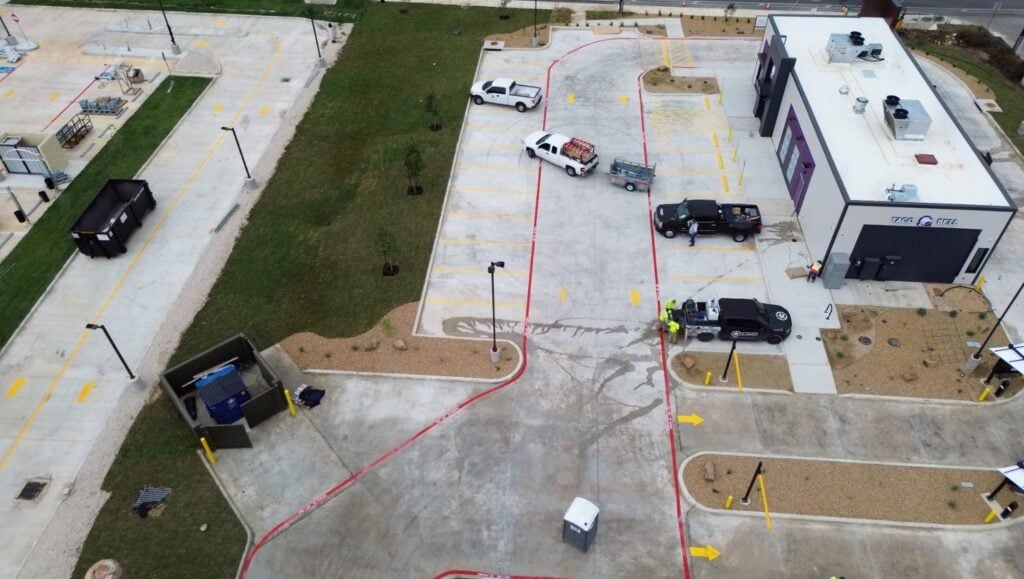 aerial view of Taco Bell parking lot freshly painted