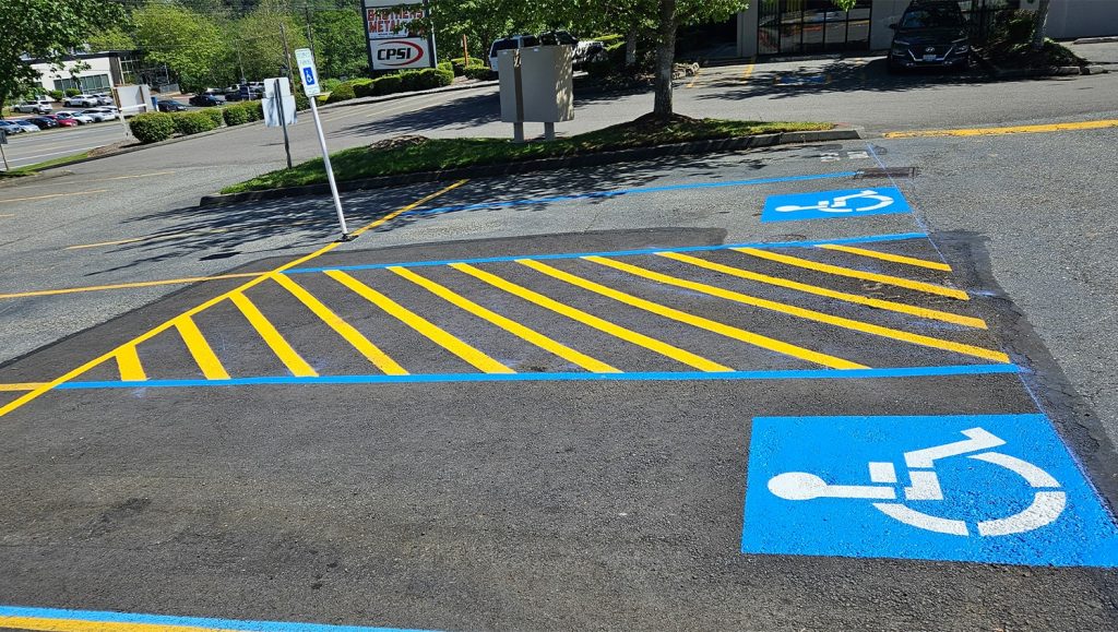 freshly painted ada compliance parking spots for NuMotion