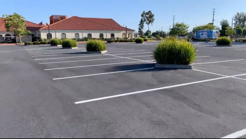ada compliance parking spots freshly painted for All Souls Cemetery & Mortuary parking lot