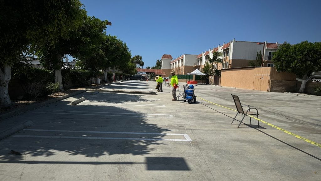 G-FORCE® employee line striping parking lot for Best Western Plus