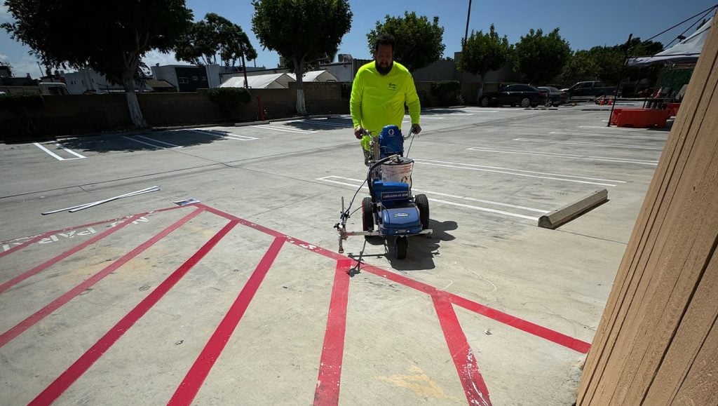 ada compliance parking spots freshly painted for Best Western Plus parking lot