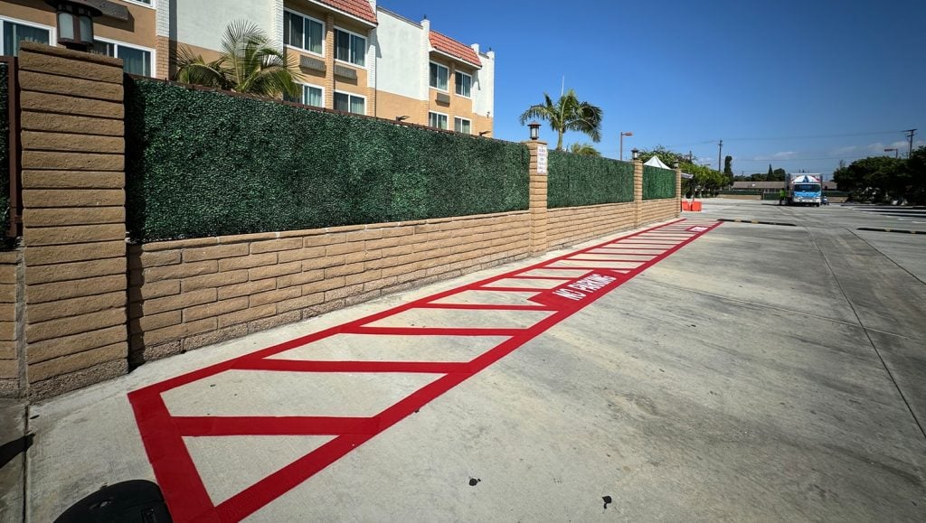 red fire lane markings for Best Western Plus parking lot