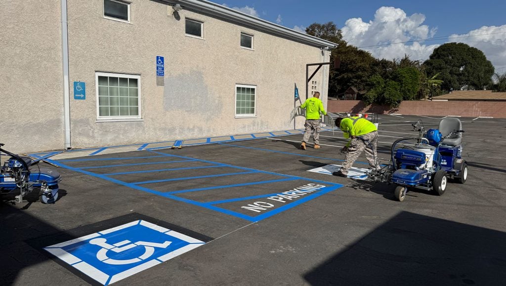 ada compliance parking spots freshly painted for Efficient Home Builders parking lo