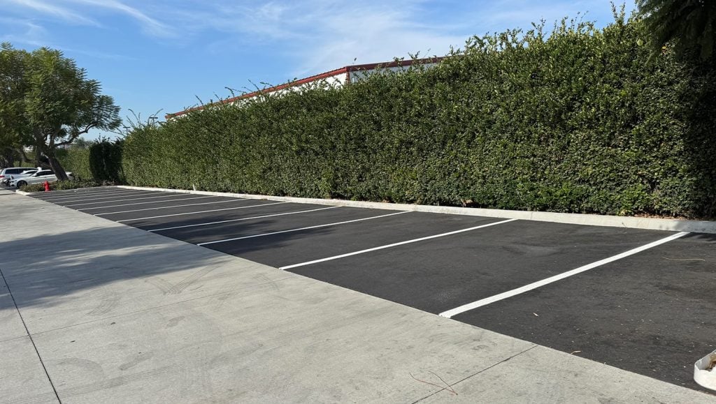 John Padgett Design and Construction parking lot with freshly painted parking spots