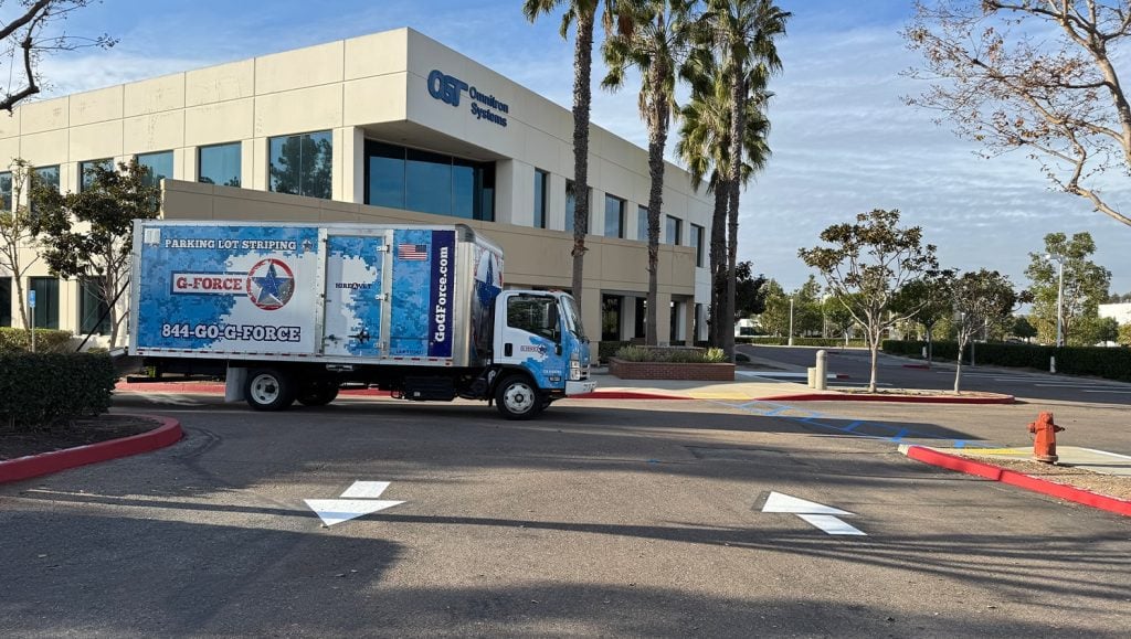 arrows freshly painted for OST Omnitron System parking lot