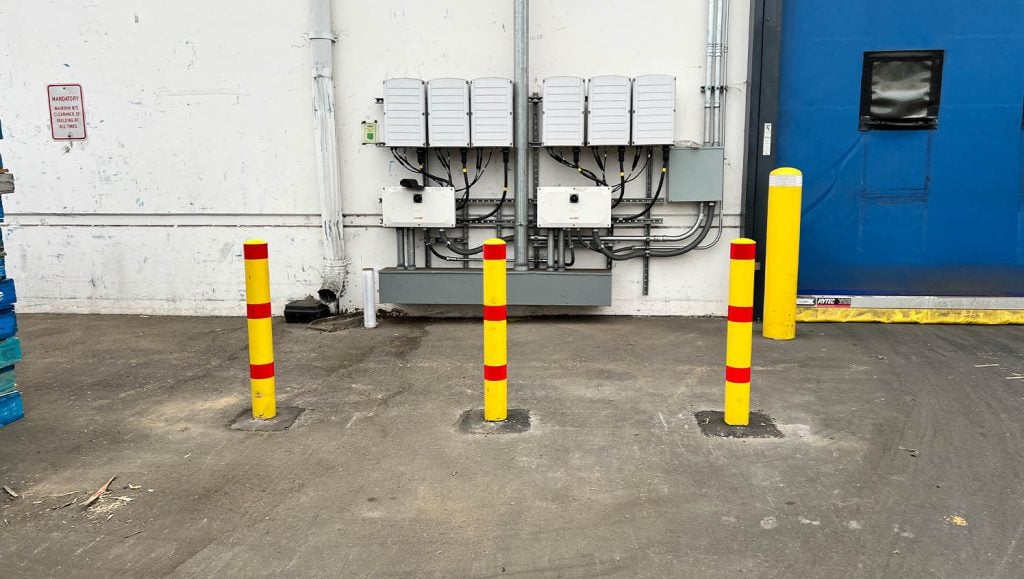 close-up of bollards at US foods parking lot