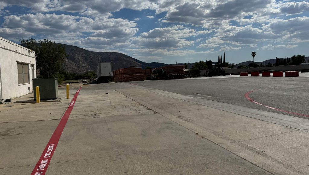 Trench Shoring parking lot with freshly painted fire lane striping