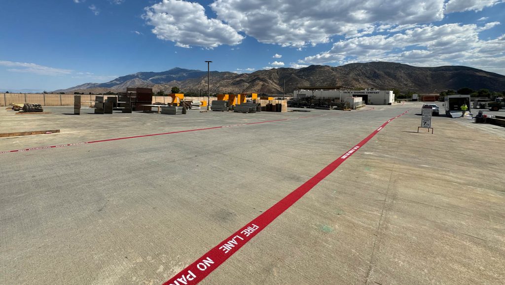 Trench Shoring parking lot with freshly painted fire lane markings