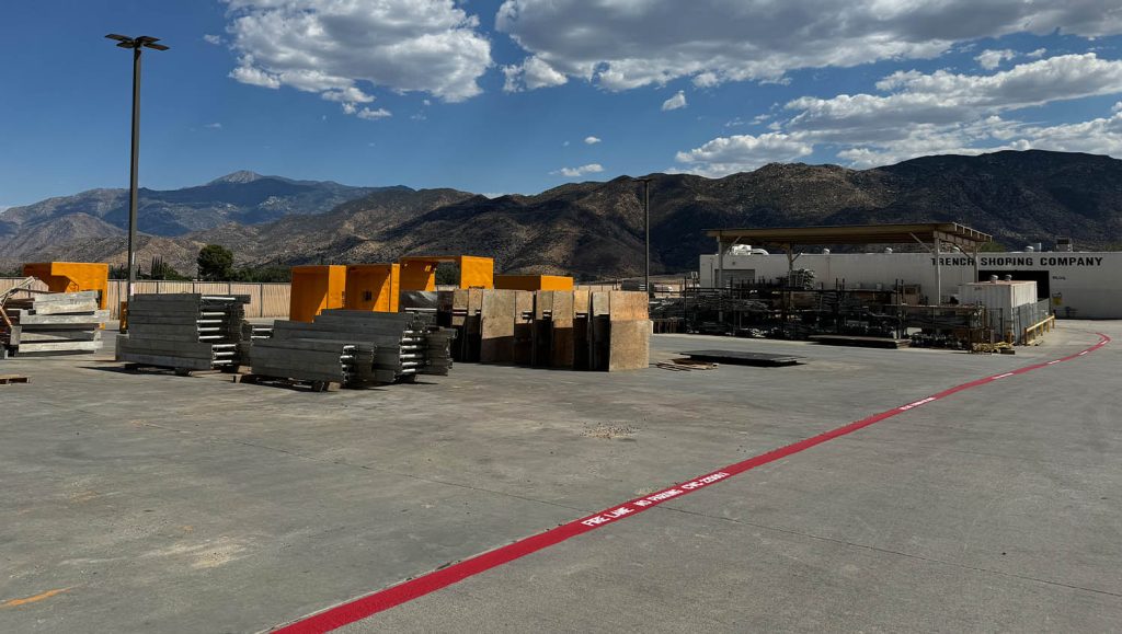 Trench Shoring parking lot with freshly painted fire lane markings