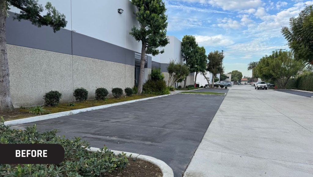 John Padgett Design and Construction parking lot before new parking spots were added