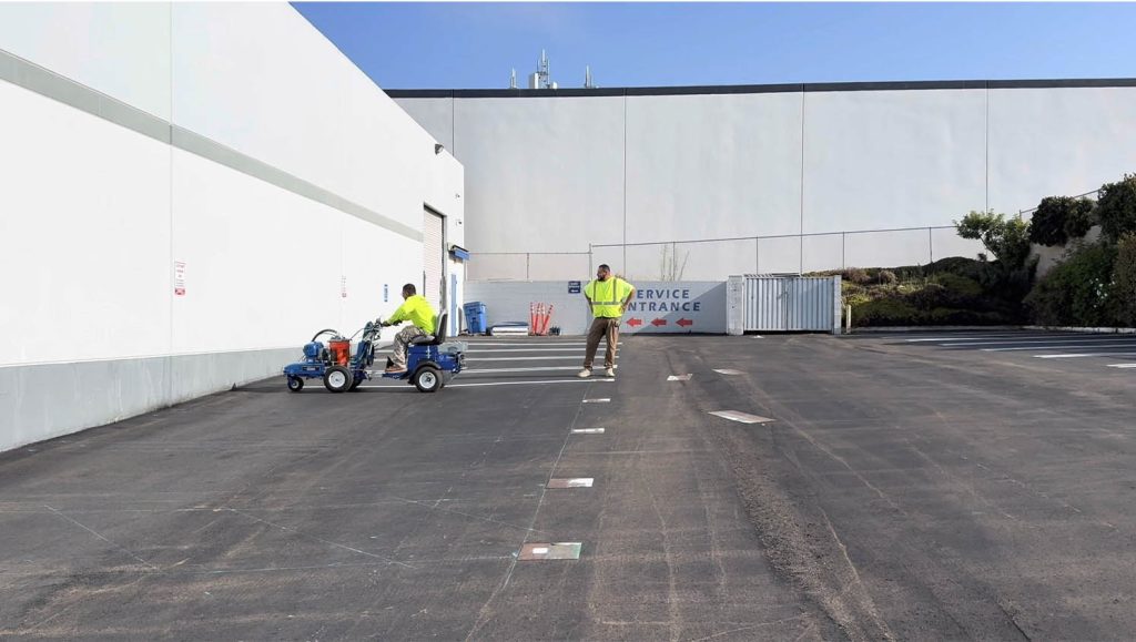 freshly painted line markings for Enagic Co parking lot