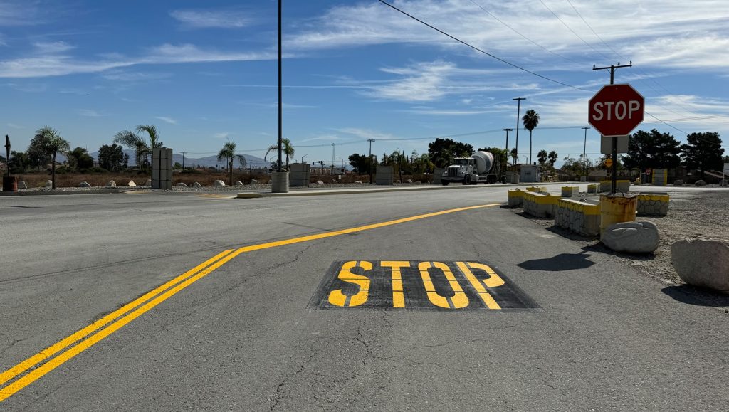 G-FORCE® employee installing new parking lot signage