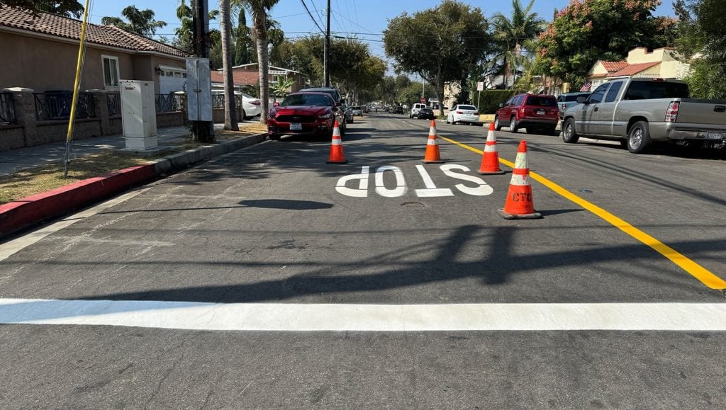 "stop" freshly painted on MAJ Engineering parking lot