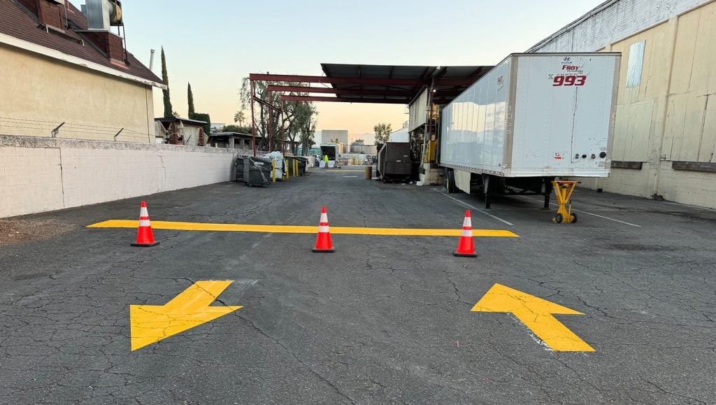 freshly painted arrows for Mizkan parking lot