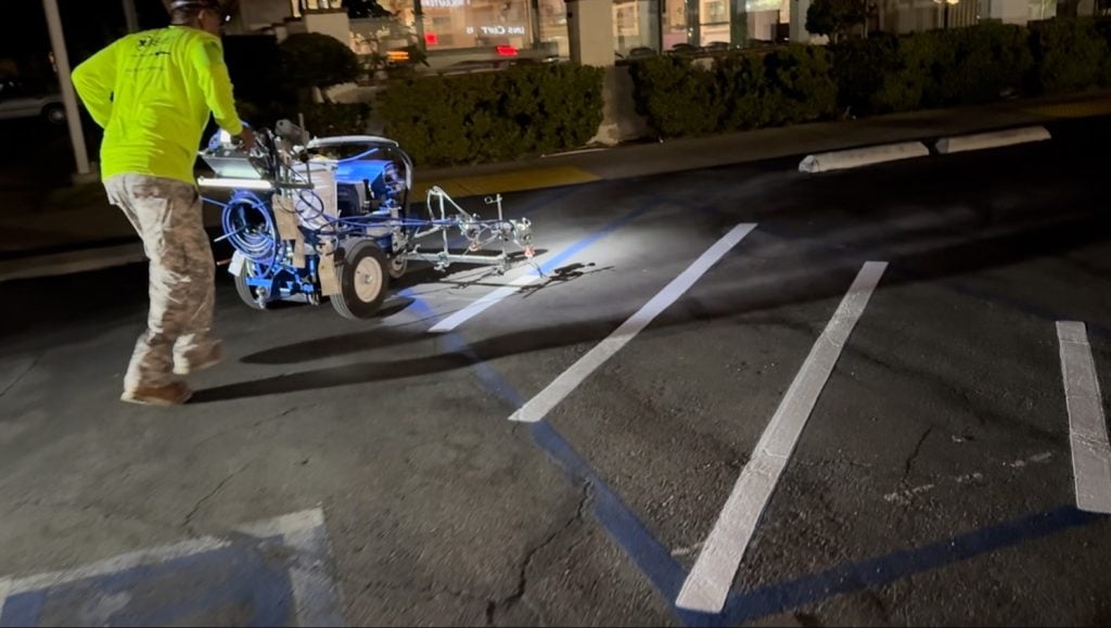 freshly painted parking spots for Keno’s Sports Bar and Grill parking lot