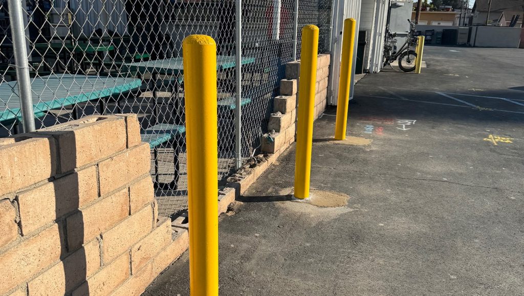 bollard installed for Moe’s 2 parking lot