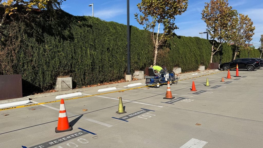 Tennis Channel parking lot getting freshly painted