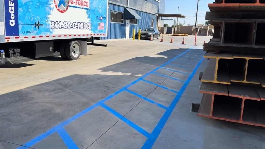parking spots freshly painted for Trench Shoring and Reed Thomas Co. parking lot