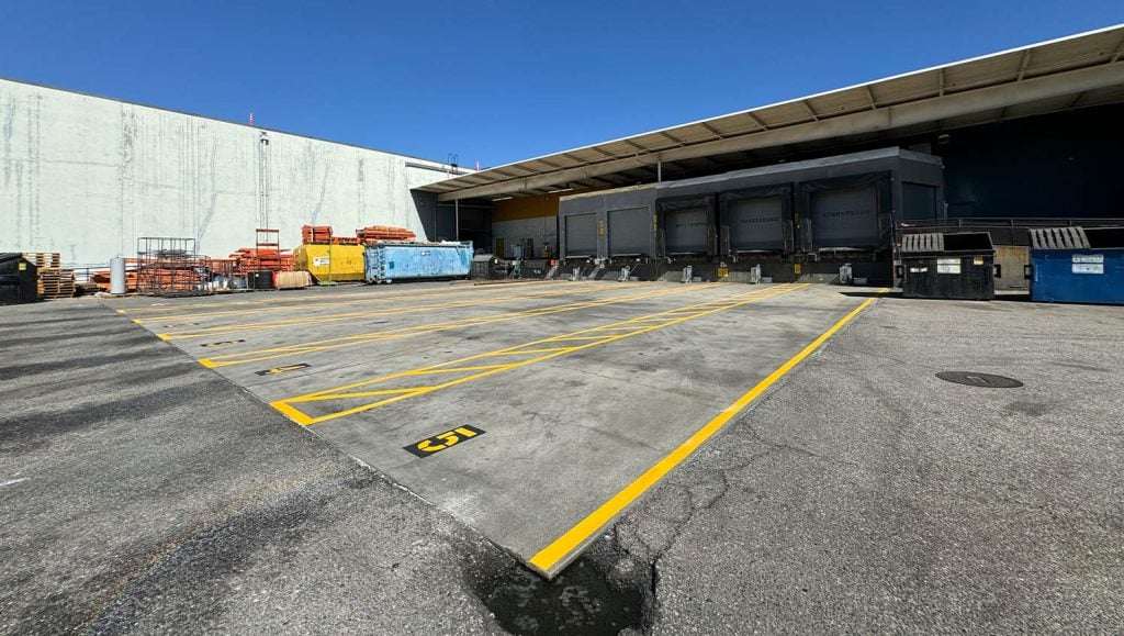 close-up freshly painted line markings for True Star Transit parking lot