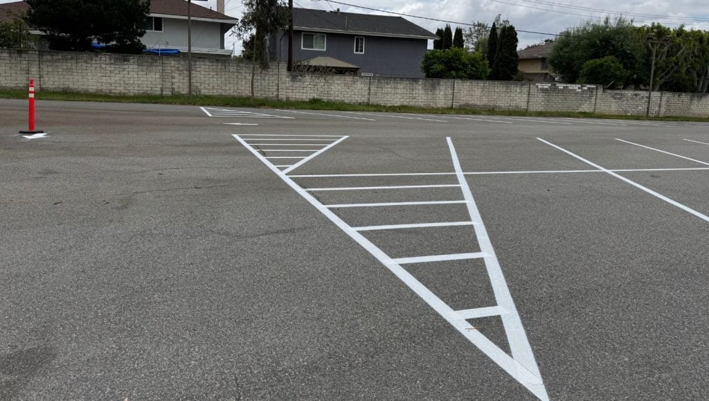 freshly painted line striping for Bumble Bee Pre-School and Revive Church parking lot