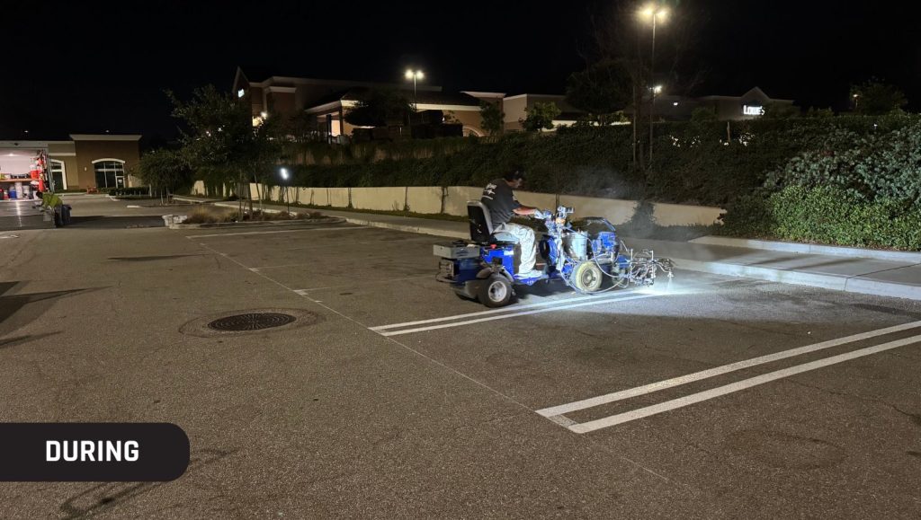 G-FORCE® employee installing new parking lot lines for LA Fitness