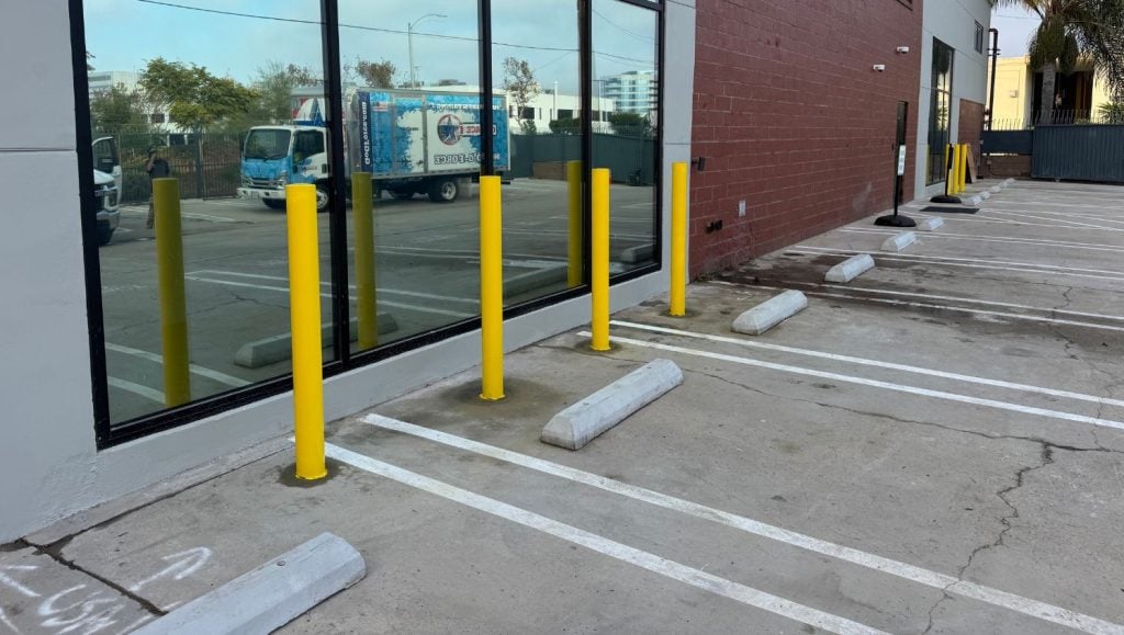 Premier Infusion parking lot with bollards freshly installed