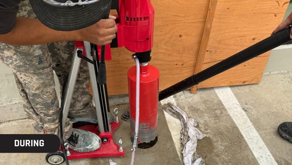 close-up of g-force employee installing new bollard for Premier Infusion